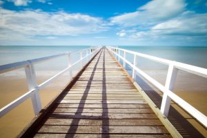 Wooden dock to the ocean